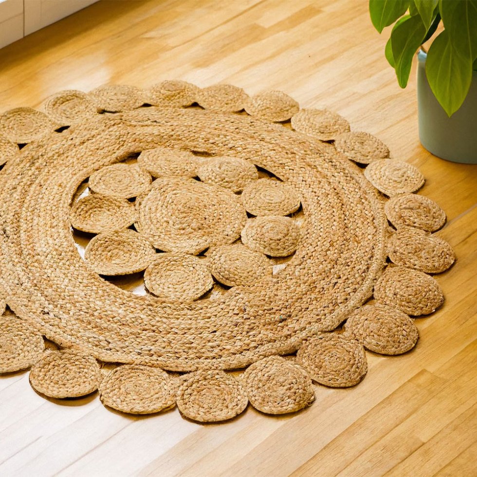 Braided round cut-out flower jute rug