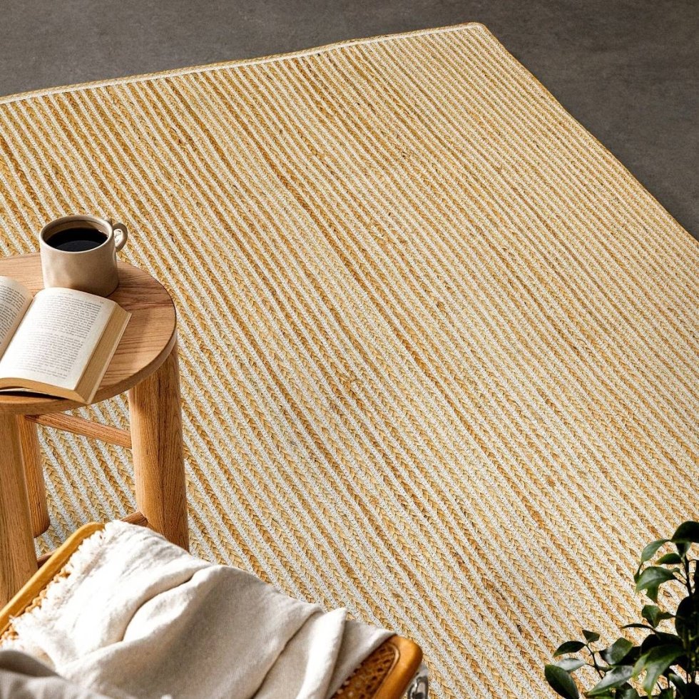 Braided white striped jute area rug