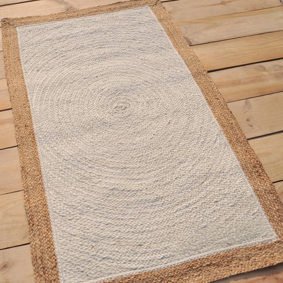 Off white jute rug with beige border