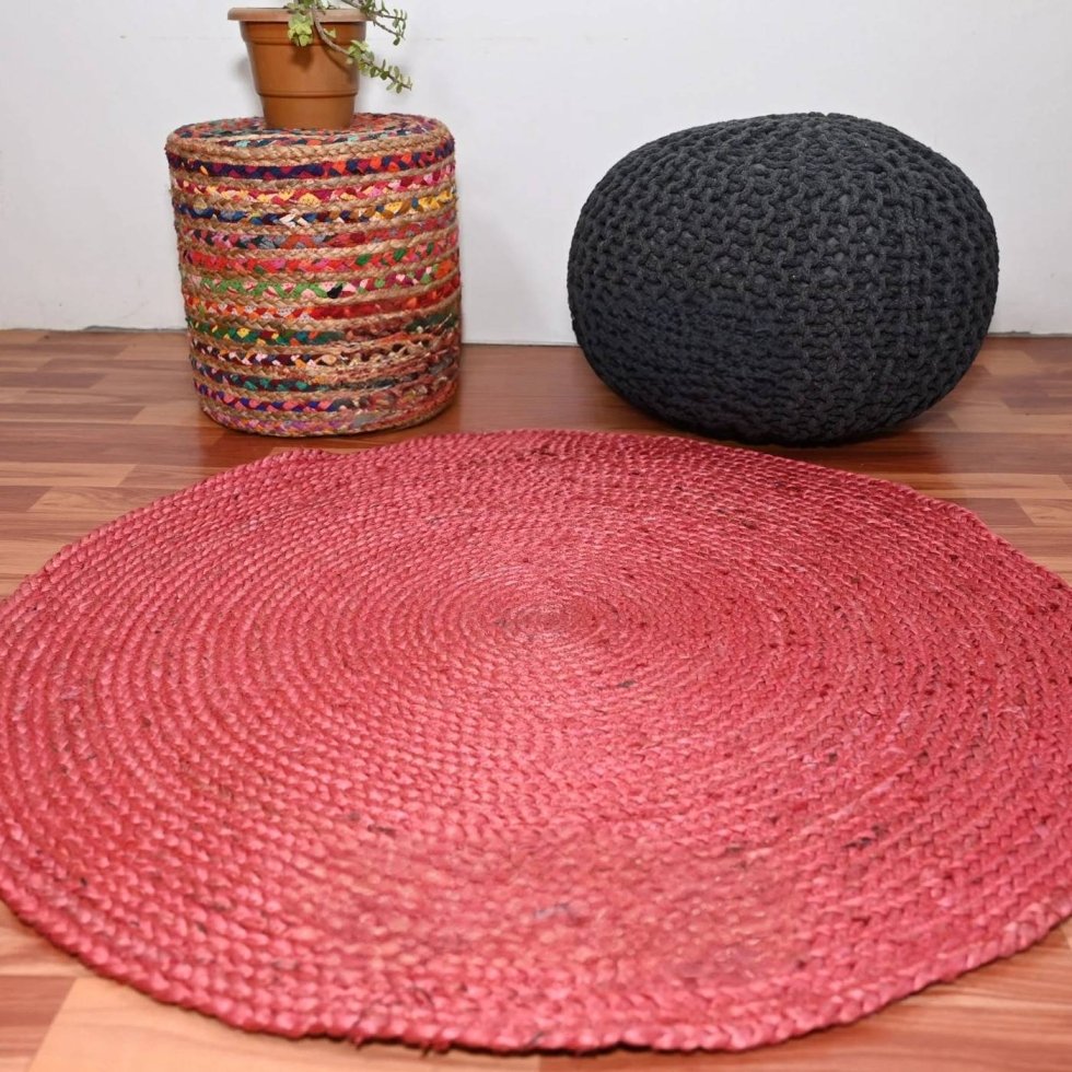 Pink braided round jute rug