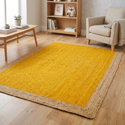 Yellow braided jute rug with natural border