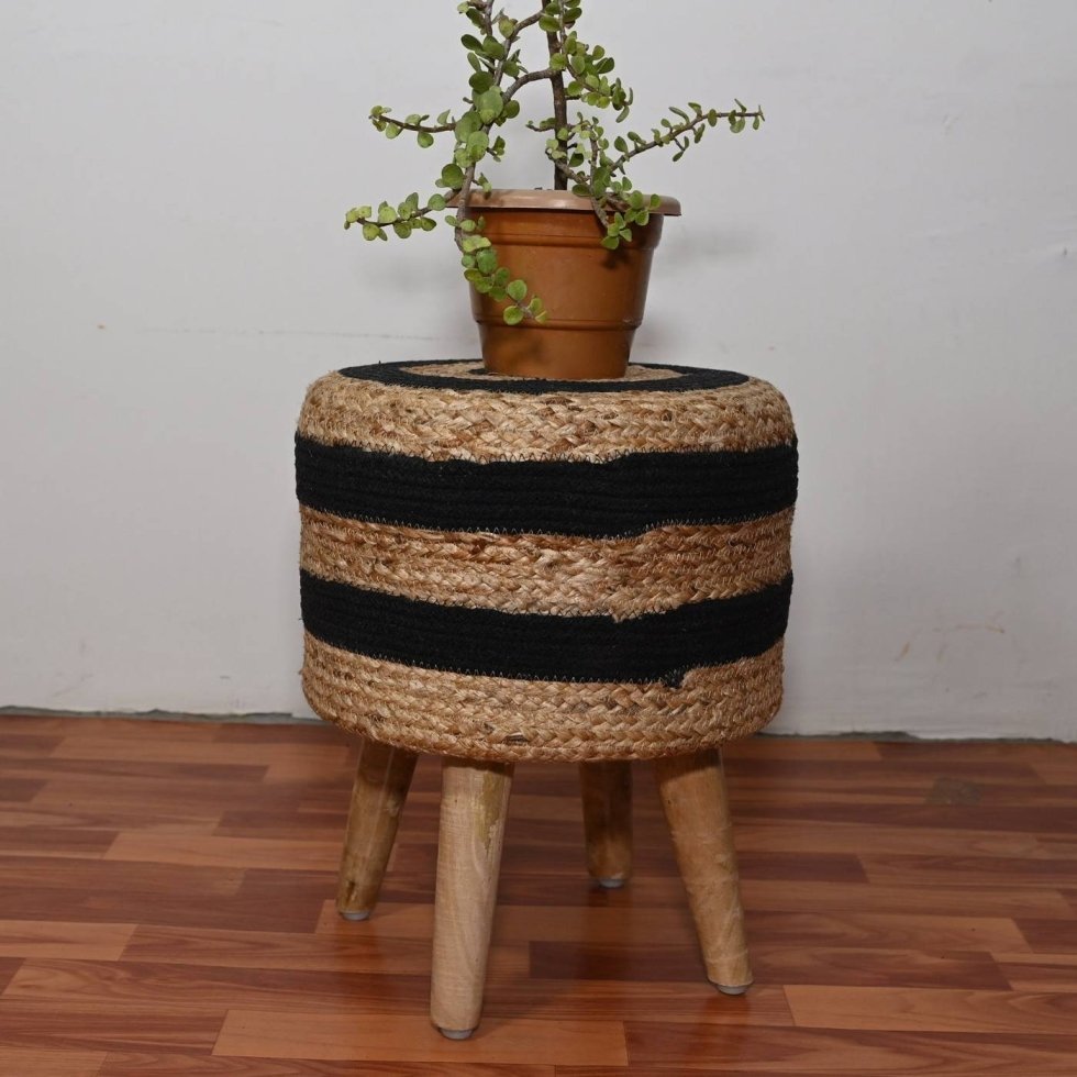 What Is A Jute Ottoman? Black and natural braided jute ottoman